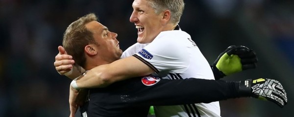 Schweinsteiger (r) and Manuel Neuer celebrate after Germany's win