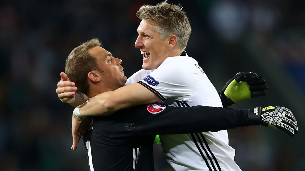 Schweinsteiger (r) and Manuel Neuer celebrate after Germany's win